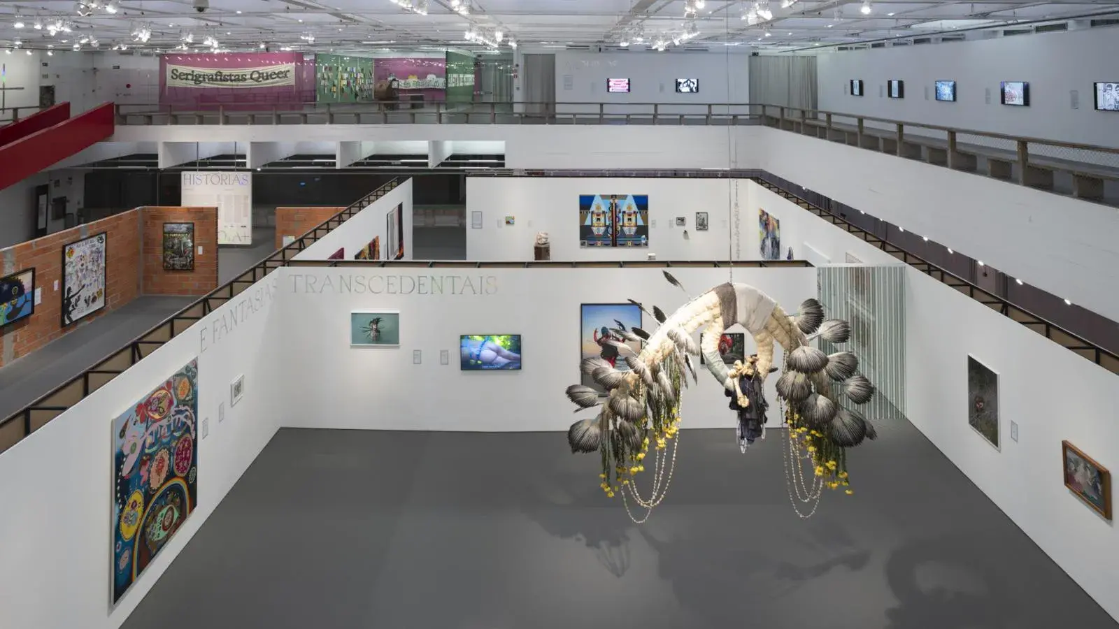 View of a gallery view rendering from above showing artwork on walls and a sculpture suspended in space