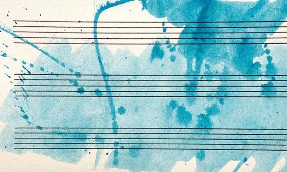 Music lines on a turquoise blue splattered background