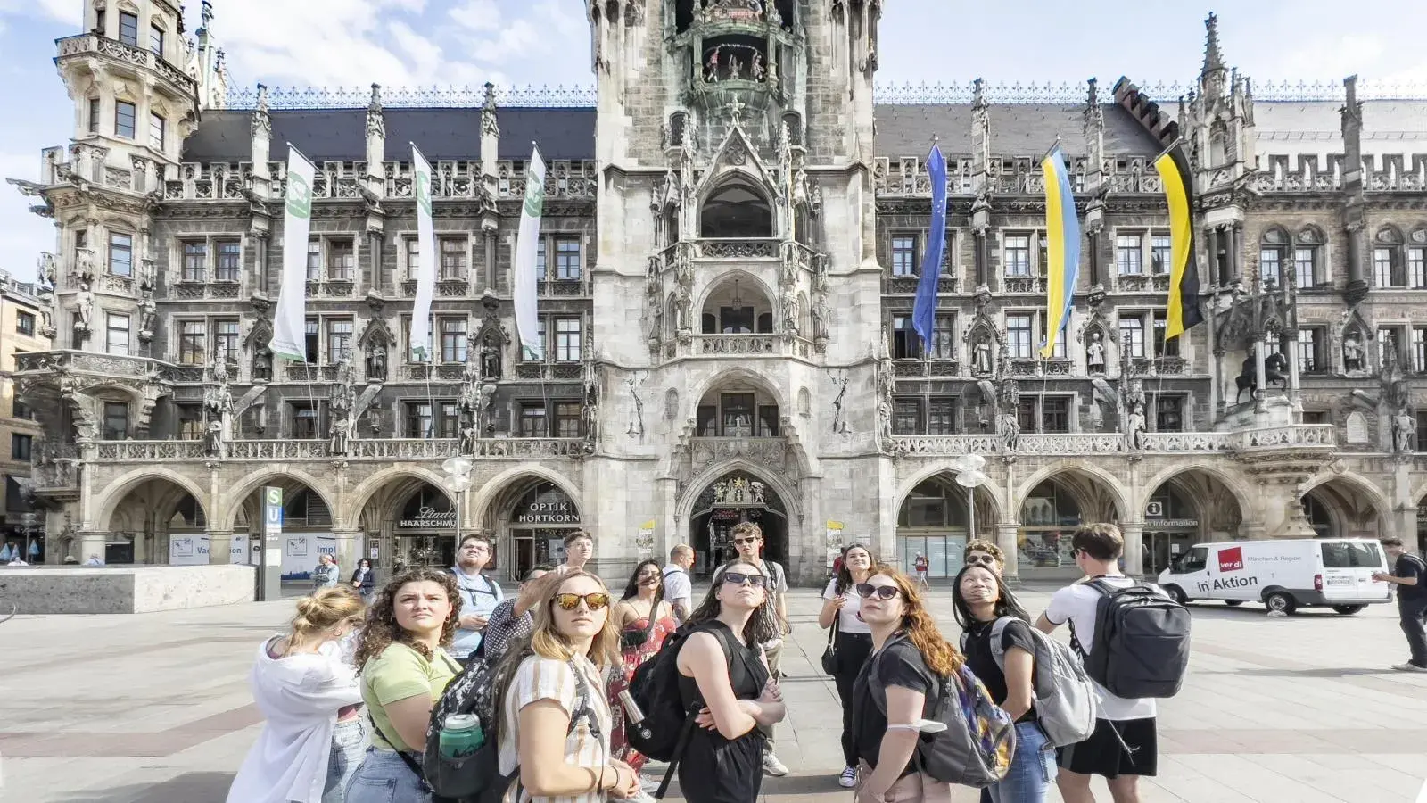 Group of students standing in front of Marienplatz building 