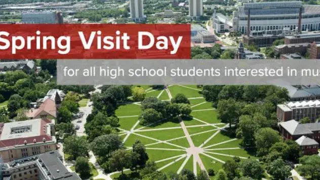 Spring Visit Day sign with the Ohio State University's Campus as the background
