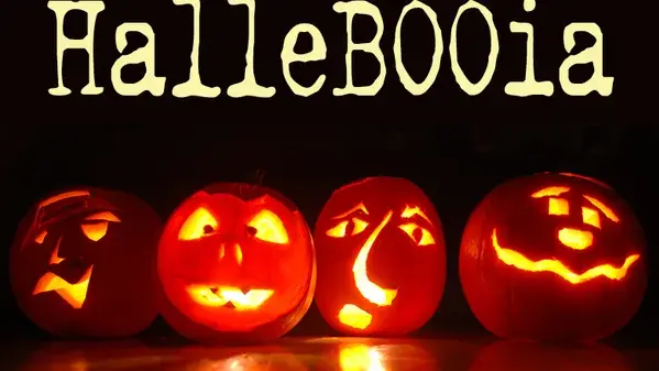 Four lit Jack-O-Lanterns with the word "HalleBOOia" above them