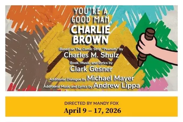 Graphic with the words "You're a Good Man Charlie Brown" over scribbles of different colors. A cartoon hand holds a brown crayon and makes a zigzag over a yellow portion in the middle.