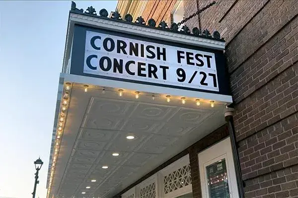 A sign that states "Cornish Fest Concert 9/27"