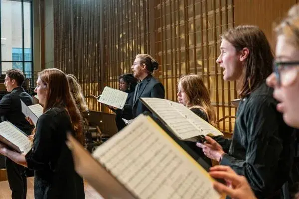 People singing in a choir.