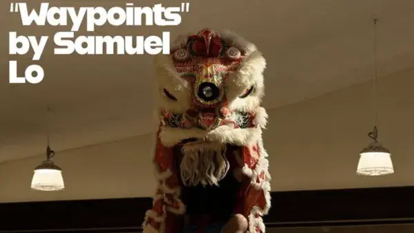 An image of a sculpture or person in a costume in a room with the words "Waypoints by Samuel Lo" on top in white
